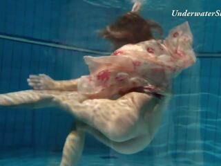 Russian teenager Edwiga swims nude in the pool in Russia