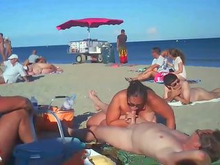 Milf Blows Her suitor On Nude Beach By Voyeurs
